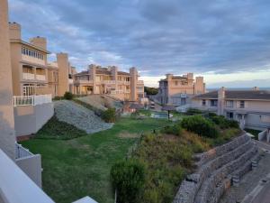 a view from the balcony of a house at Pincushion Place Pinnacle Point Mosselbay South Africa in Mossel Bay