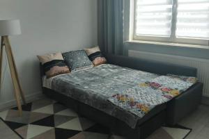 Krevet ili kreveti u jedinici u okviru objekta New cozy apartment near the center, Mokotów