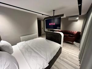 Postel nebo postele na pokoji v ubytování BALA HOTEL