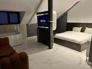 Postel nebo postele na pokoji v ubytování BALA HOTEL