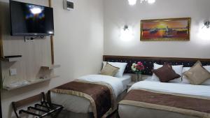 Postel nebo postele na pokoji v ubytování BeyazitHan Suites Old City