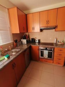 Кухня или мини-кухня в Apartament na Cyprze
