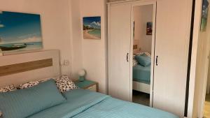 Ein Bett oder Betten in einem Zimmer der Unterkunft Isla Verde Apartment