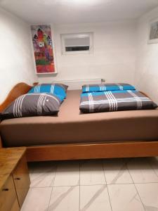 Postel nebo postele na pokoji v ubytování Schöne Einliegerwohnung in Hechingen