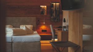 Rúm í herbergi á Bauernhof Hotel Oberschwarzach