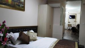 Postel nebo postele na pokoji v ubytování BeyazitHan Suites Old City