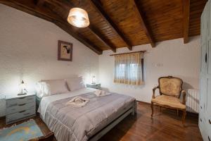 Postel nebo postele na pokoji v ubytování Chalet Renata 2 Livadi Arachovas
