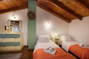 Postel nebo postele na pokoji v ubytování Chalet Renata 2 Livadi Arachovas