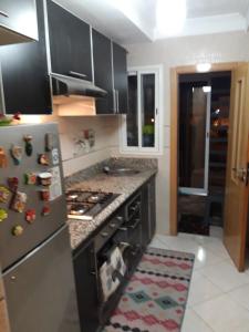 Kjøkken eller kjøkkenkrok på Appartement Adrar