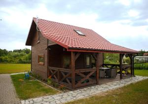 Gallery image of Sajzy Zacisze - domki nad jeziorem Łaśmiady in Sajzy