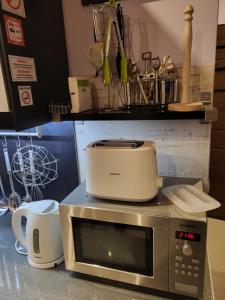 Kuchyňa alebo kuchynka v ubytovaní Apartament Bystra Woda 28 z garażem