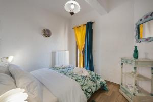 a bedroom with a bed and a window at Villa Dianne Apt 1 Livadi Arachovas in Arachova