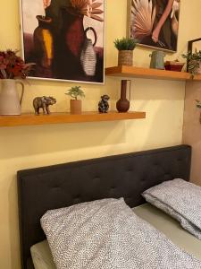 Posteľ alebo postele v izbe v ubytovaní Jungle Story Apartment by Millenaris Park with Free Parking