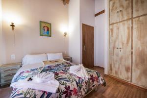 מיטה או מיטות בחדר ב-Villa Dianne Apt 2 Livadi Arachovas