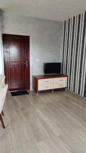 TV a/nebo společenská místnost v ubytování Good Inn
