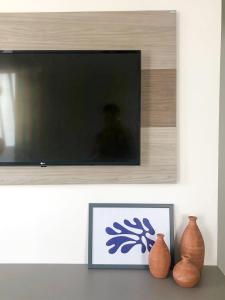 TV i/ili multimedijalni sistem u objektu Casa Iva - Condomínio Fechado