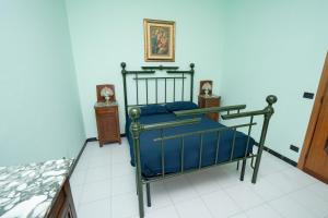 Postel nebo postele na pokoji v ubytování Casa Lago e Camino