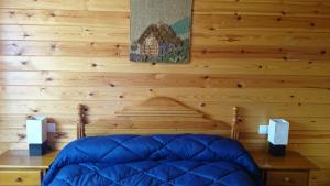 A bed or beds in a room at Casa Rural los Caños