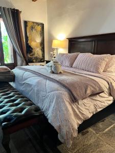 Postel nebo postele na pokoji v ubytování Tres Fuentes Hotel Boutique