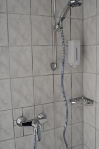Koupelna v ubytování Garni Hotel-Pension Holum