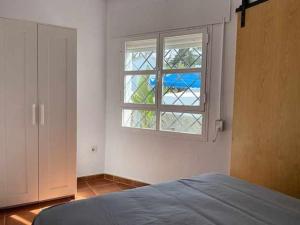 Posteľ alebo postele v izbe v ubytovaní Casita para 2 personas piscina privada playa + 13 fotografií