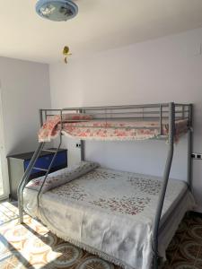 Posteľ alebo postele v izbe v ubytovaní LA GARROFERA