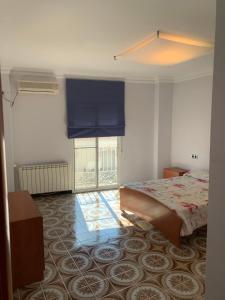 Posteľ alebo postele v izbe v ubytovaní LA GARROFERA