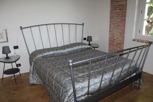 Кровать или кровати в номере Il Colombee