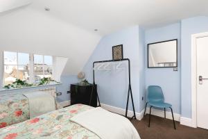 Tempat tidur dalam kamar di Brighton Lanes 3BR Apartment