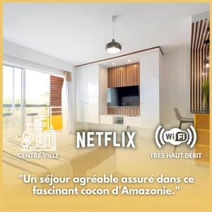 een weergave van een woonkamer met een tv bij Lumina - DestinationGuyane - Séjours d'affaires - Services personnalisés in Cayenne