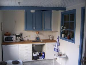 Kuchyň nebo kuchyňský kout v ubytování Hus 174