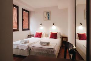 Postel nebo postele na pokoji v ubytování Hotel Castrum