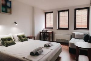 Postel nebo postele na pokoji v ubytování Hotel Castrum