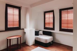 Postel nebo postele na pokoji v ubytování Hotel Castrum