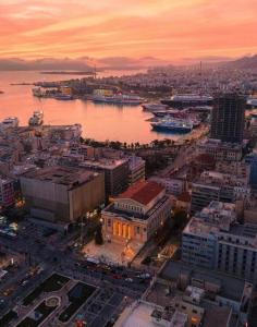 an aerial view of a city with a river and buildings at CASA VERDE di Giorgio 10 mins walk from Piraeus port in Piraeus