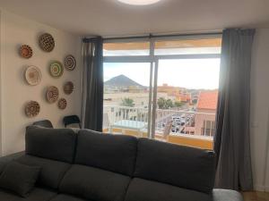 Posezení v ubytování Fantástico piso con piscina y balcón en el Medano