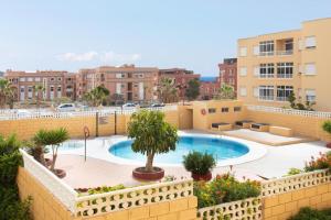 Bazén v ubytování Fantástico piso con piscina y balcón en el Medano nebo v jeho okolí