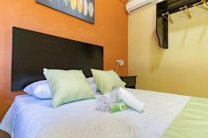 Vuode tai vuoteita majoituspaikassa El Cocobolo Food&Rest Room 1 Bed and Breakfast WiFi AC Pkg gratis