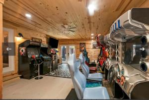 a fire truck garage with wooden walls and ceiling at Dollys Retreat in Pigeon Forge