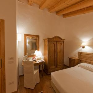 Llit o llits en una habitació de Villa Toderini