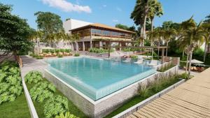 a swimming pool in front of a building at Eco Resort Quinta Santa Bárbara in Pirenópolis