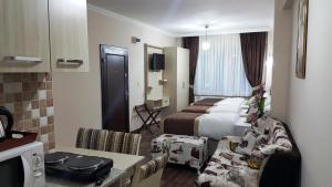 Postel nebo postele na pokoji v ubytování BeyazitHan Suites Old City