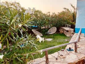 Изглед към басейн в El Refugio del Viento-Chimenea, jardín y baño japonés или наблизо