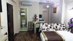 Postel nebo postele na pokoji v ubytování BeyazitHan Suites Old City