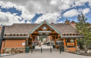 a wooden building with a sign in front of it at Silver Mill 8154 in Keystone