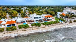 an aerial view of a house on the beach at Villa Coral Ocean Front Progreso in Progreso