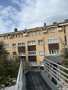 a large building with a walkway in front of it at MARIBEL ELITE in Sierra Nevada