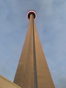 a view of the spire of a tower with a ferris wheel at BIG Oasis Studio near Airport YYZ in Toronto