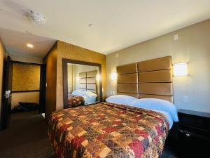 Säng eller sängar i ett rum på Hotel Key