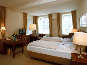Voodi või voodid majutusasutuse Bergström Hotel Lüneburg toas